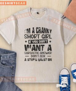 Alt Text: Cranky short girl wearing a sarcastic 'Awesome I'm A Cranky' washed t-shirt, showcasing her playful attitude.