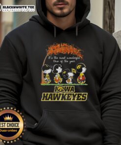 Alt Text: Cozy Iowa Hawkeyes X Peanuts Snoopy hoodie perfect for autumn, celebrating It's the Most Wonderful Time of the Year.