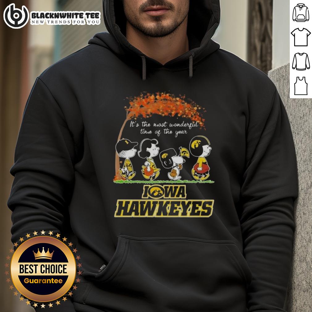Awesome Iowa Hawkeyes X Peanuts Snoopy And Friends Autumn It's The Most Wonderful Time Of The Year Hoodie Alt Text: Cozy Iowa Hawkeyes X Peanuts Snoopy hoodie perfect for autumn, celebrating It's the Most Wonderful Time of the Year.