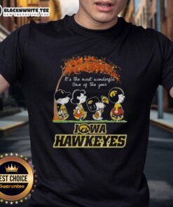 Alt Text: Iowa Hawkeyes X Peanuts Snoopy and Friends autumn t-shirt celebrating the most wonderful time of the year.