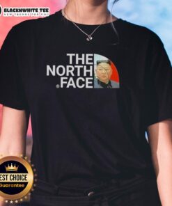 Alt Text: Awesome Kim Jong Un wearing The North Face ladies tee, showcasing a stylish and unique fashion statement.