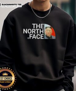 Alt Text: Kim Jong Un wearing an Awesome North Face sweatshirt, showcasing a unique and trendy style.