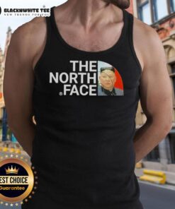 Kim Jong Un wearing The North Face tank top, showcasing a unique style in a vibrant outdoor setting.