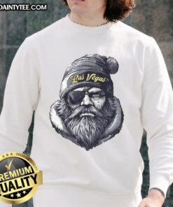 Awesome Las Vegas Raiders mascot in a beanie and sunglasses, wearing a sweatshirt, showcasing team spirit.