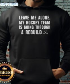 Awesome Leave Me Alone My Hockey Team Is Going Through A Rebuild Hoodie in navy, perfect for passionate hockey fans.