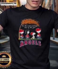 Alt Text: Los Angeles Angels X Peanuts Snoopy and Friends autumn t-shirt featuring 'It's The Most Wonderful Time Of The Year' design.