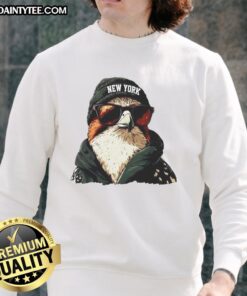 Awesome New York Jets mascot in a beanie and sunglasses, wearing a sweatshirt, ready for game day fun.