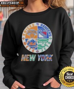 Alt Text: Awesome New York Knicks, Mets, Jets, and Rangers mashup logo sweatshirt showcasing NYC sports pride.