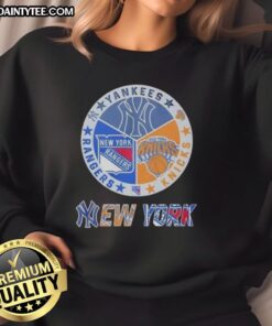 Alt Text: Awesome New York Yankees, Rangers, and Knicks mashup logo sweatshirt showcasing team pride and style.