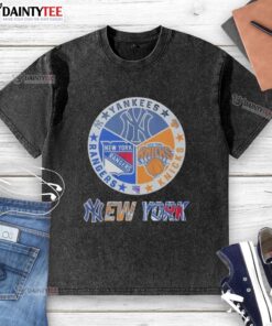 Awesome New York Yankees, Rangers, and Knicks mashup logo on a washed t-shirt, perfect for sports fans.
