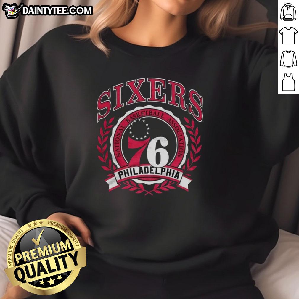 awesome-philadelphia-76ers-national-basketball-association-logo-laurel-wreath-frame-retro-sweatshirt Alt Text: Retro sweatshirt featuring the Philadelphia 76ers NBA logo framed by a laurel wreath, perfect for basketball fans.