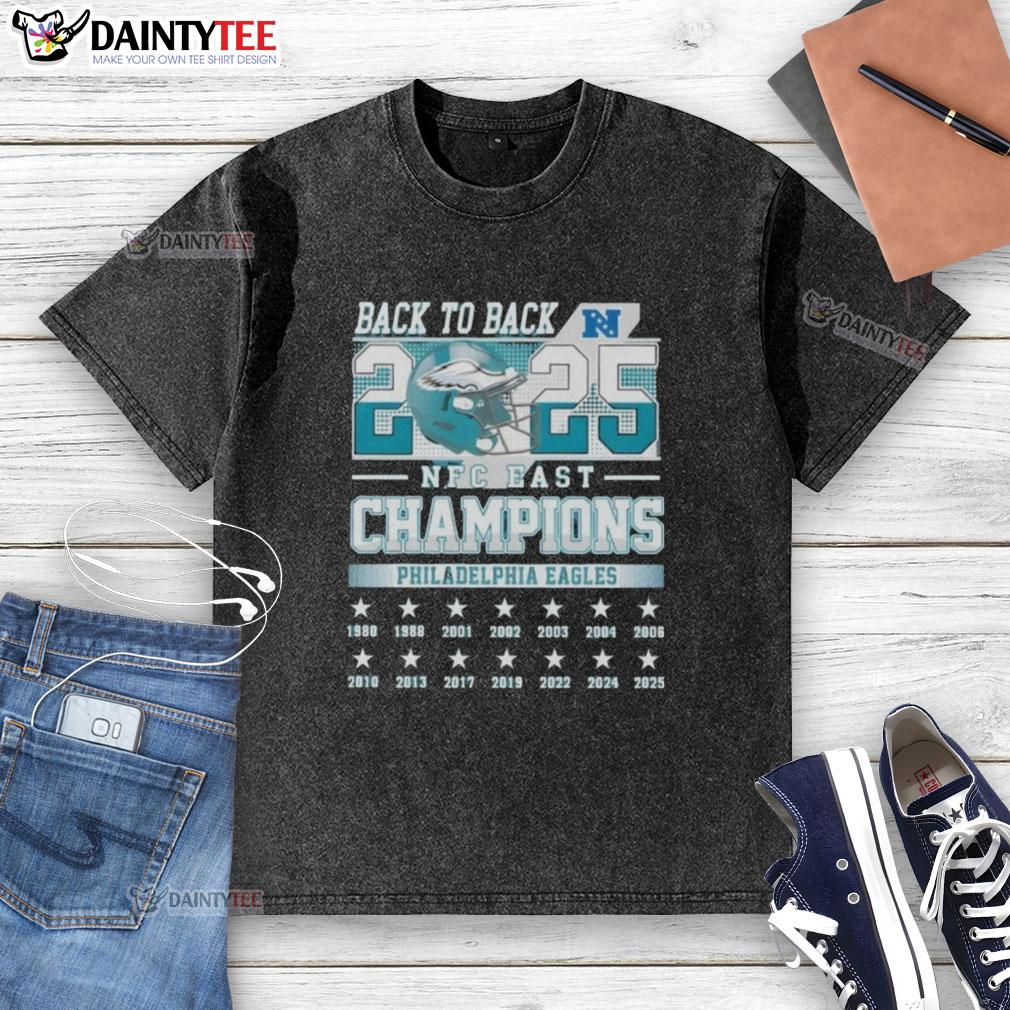 awesome-philadelphia-eagles-football-nfc-east-champions-back-to-back-2025-washed-t-shirt Alt Text: Awesome Philadelphia Eagles Football NFC East Champions Back-to-Back 2025 Washed T-Shirt displayed on a hanger.
