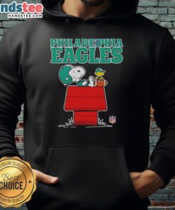 Alt Text: Snoopy in a Philadelphia Eagles hoodie, relaxing with a football in Peanuts style, perfect for Eagles fans.