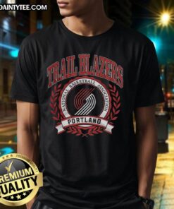 Alt Text: Retro Portland Trail Blazers NBA logo T-shirt featuring a laurel wreath frame design for fans and collectors.