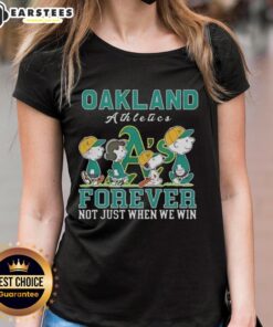 Awesome Snoopy and Charlie Brown Oakland Athletics baseball tee for ladies, celebrating fandom beyond just winning.