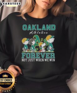 Alt Text: Awesome Snoopy and Charlie Brown Oakland Athletics baseball sweatshirt for fans, celebrating love for the team.