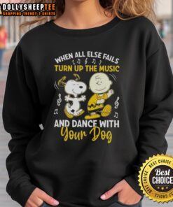 Awesome Snoopy and Charlie Brown sweatshirt featuring a fun quote about music and dancing with your dog.