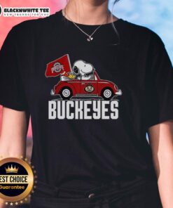 Alt Text: Snoopy and Woodstock driving a car with Ohio State Buckeyes flag on a ladies tee, perfect for fans and casual wear.