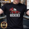 Alt Text: Snoopy and Woodstock joyfully driving a car, wearing an Ohio State Buckeyes flag t-shirt, showcasing a fun team spirit.