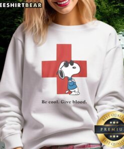 Awesome Snoopy Be Cool Give Blood sweatshirt featuring a vibrant Snoopy graphic, perfect for casual wear and blood donation support.