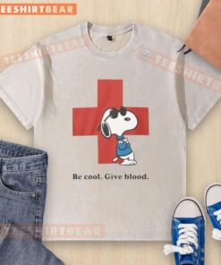 Awesome Snoopy Be Cool Give Blood washed t-shirt featuring a playful Snoopy design promoting blood donation.