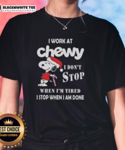 Awesome Snoopy Christmas tee for ladies: 'I Work At Chewy, I Don't Stop When I'm Tired, I Stop When I'm Done.'