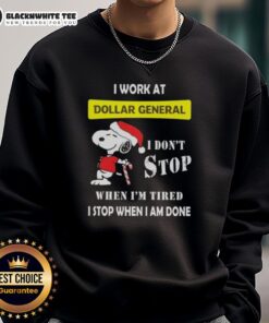 Alt Text: Awesome Snoopy Christmas sweatshirt from Dollar General with motivational quote: 'I don't stop when I'm tired, I stop when I'm done.'