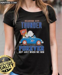 Alt Text: Snoopy and Charlie Brown driving a car, showcasing 'Oklahoma City Thunder Forever' on a ladies tee design.