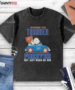 Alt Text: Snoopy and Charlie Brown in a car, wearing an 'Oklahoma City Thunder Forever' washed t-shirt, showcasing team spirit.