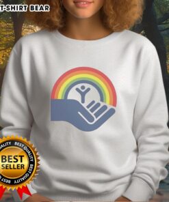 Brennan Huff wearing an Awesome Step Brothers rainbow sweatshirt, supporting United Way charity event.