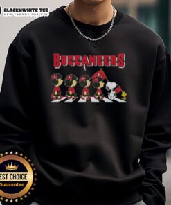 Awesome Tampa Bay Buccaneers X Peanuts Snoopy and Friends Abbey Road sweatshirt featuring iconic characters in football gear.