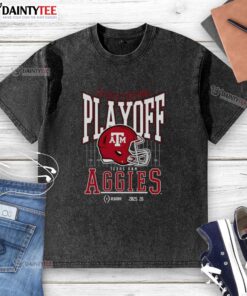 Alt Text: Awesome Texas A&M Aggies 2025-2026 College Football Playoff Bound helmet washed t-shirt displayed on a hanger.