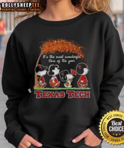 Awesome Texas Tech Red Raiders sweatshirt featuring Snoopy and friends, perfect for autumn and holiday cheer.