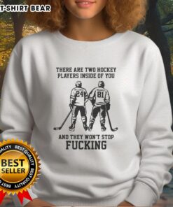 Awesome sweatshirt featuring two hockey players graphic, perfect for fans who love the sport and its intensity.