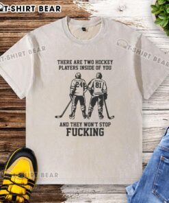 Awesome 'There Are Two Hockey Players Inside Of You' washed t-shirt featuring bold graphics and sporty design.