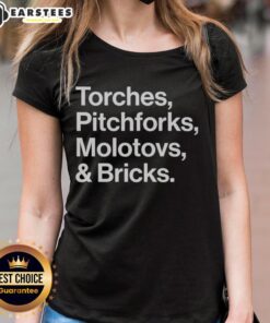 Awesome torches, pitchforks, Molotovs, and bricks graphic on a 2025 World Tour ladies tee, perfect for protest enthusiasts.