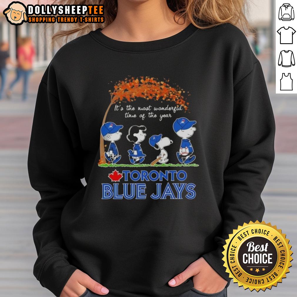 Awesome Toronto Blue Jays X Peanuts Snoopy And Friends Autumn It's The Most Wonderful Time Of The Year Sweatshirt Awesome Toronto Blue Jays X Peanuts Snoopy sweatshirt for autumn, celebrating 'It's The Most Wonderful Time of The Year'.
