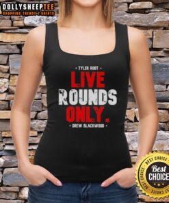 Awesome Tyler Root wearing a Live Rounds Only Drew Blackwood tank top at an outdoor event, showcasing stylish graphic design.