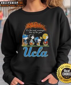 UCLA Bruins sweatshirt featuring Snoopy and friends, perfect for autumn and celebrating the most wonderful time of the year.