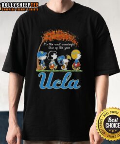 Alt Text: UCLA Bruins X Peanuts Snoopy T-shirt showcasing autumn theme, perfect for celebrating 'It's the Most Wonderful Time of the Year'.