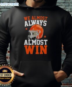 Funny football fan hoodie featuring 'Awesome, We Almost Always Win' slogan, perfect for game day enthusiasts.