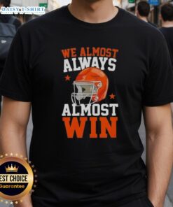 Awesome We Almost Always Almost Win funny football fan T-shirt design featuring a humorous slogan for sports enthusiasts.