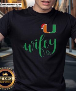 Awesome Wifey Miami Hurricanes Santa Hat Merry Christmas T-Shirt featuring festive design and team colors for holiday cheer.