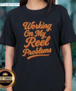 Fishing ladies tee with 'Awesome Working on My Reel Problems' design, perfect for fishing enthusiasts and casual wear.