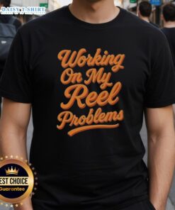 Awesome Working On My Reel Problems Fishing T-Shirt featuring a fun graphic design for fishing enthusiasts.