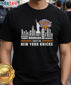 Alt Text: Cute New York Knicks Basketball T-Shirt featuring 2025-26 team names and city skyline design.