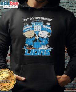 Alt Text: Cute Charlie Brown and Snoopy hoodie celebrating the 96th anniversary (1930-2026) with Detroit Lions football skyline.
