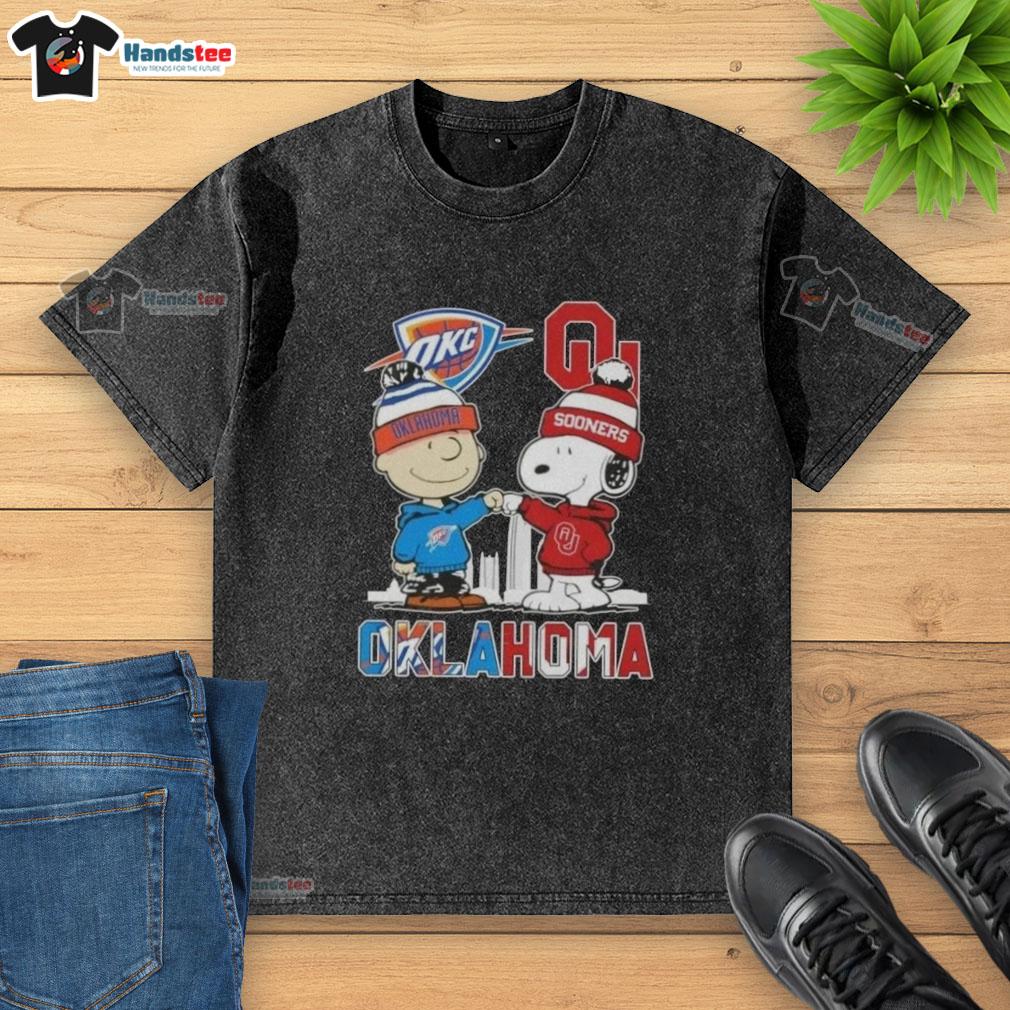 cute-charlie-brown-and-snoopy-oklahoma-city-sports-thunder-x-sooners-skyline-washed-t-shirt Alt Text: Cute Charlie Brown and Snoopy on an Oklahoma City Skyline washed t-shirt featuring Thunder and Sooners logos.