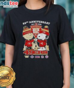 Alt Text: Cute Charlie Brown and Snoopy celebrate Super Bowl 82nd Anniversary 1944-2026 with 49ers football skyline ladies tee.