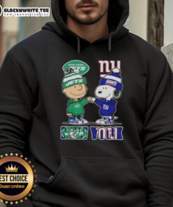 Cute Charlie Brown fist bump with Snoopy in New York City sports hoodie featuring Jets and Giants logo.